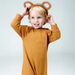 Baby playsuit in Trend orange