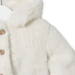 Fur coat in Black ecru